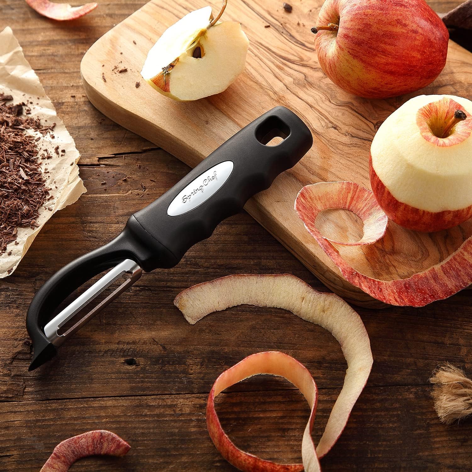 Pelador premium de verduras giratorio, gancho para colgar para almacenamiento práctico.