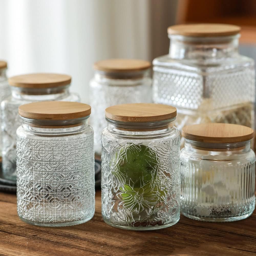 Organizador de cocina con frascos de vidrio Prettidecor para mantener la encimera limpia.