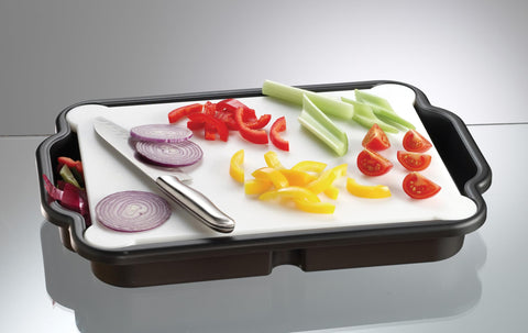 Prodyne Prep & Slice BB-16, ranuras laterales para dirigir residuos a la bandeja.