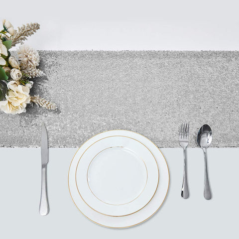 Pufogu accesorio de lentejuelas plateadas para hacer brillar la mesa.