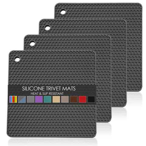 QPIX DIGITAL Trivet de silicona cuadrado negro protege superficies ante el calor.