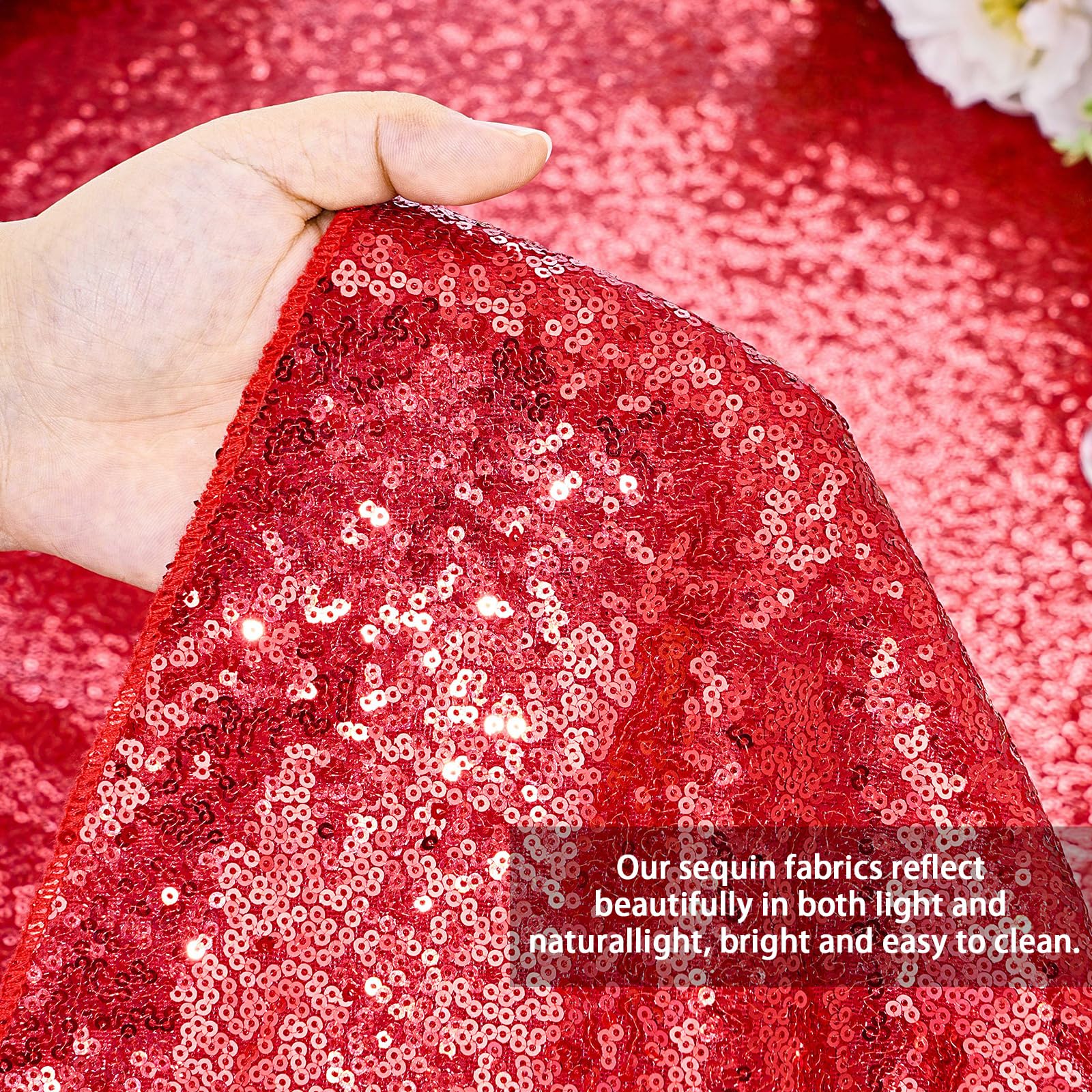 Detalle brillante del mantel QueenDream en rojo.