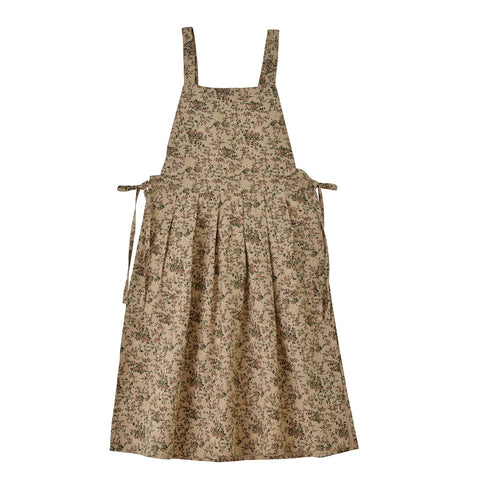 Delantal Quinieda con bolsillo frontal y diseño floral para cocinar con comodidad.