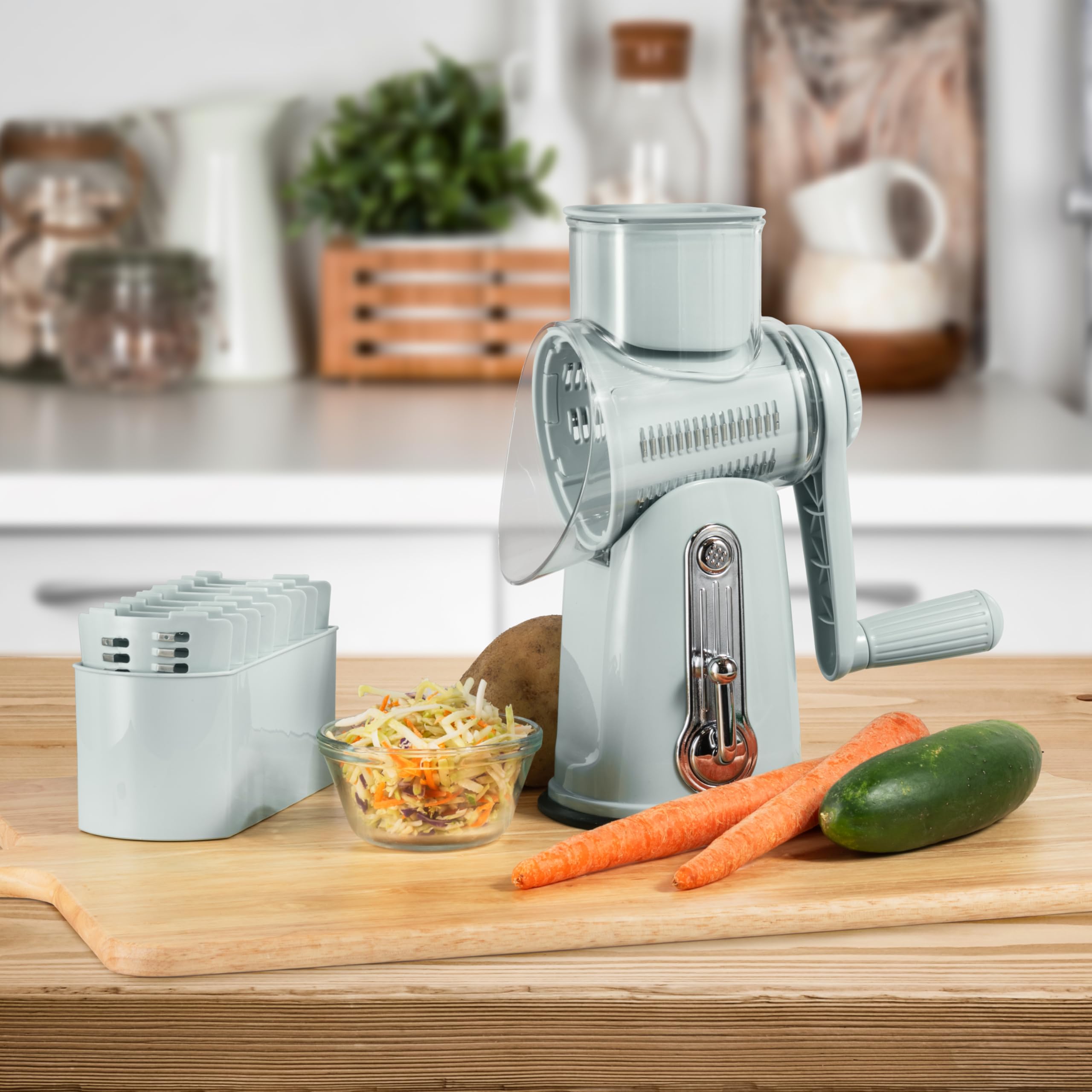 Rallador Rotatorio 5 en 1, diseño compacto para cocinas pequeñas.