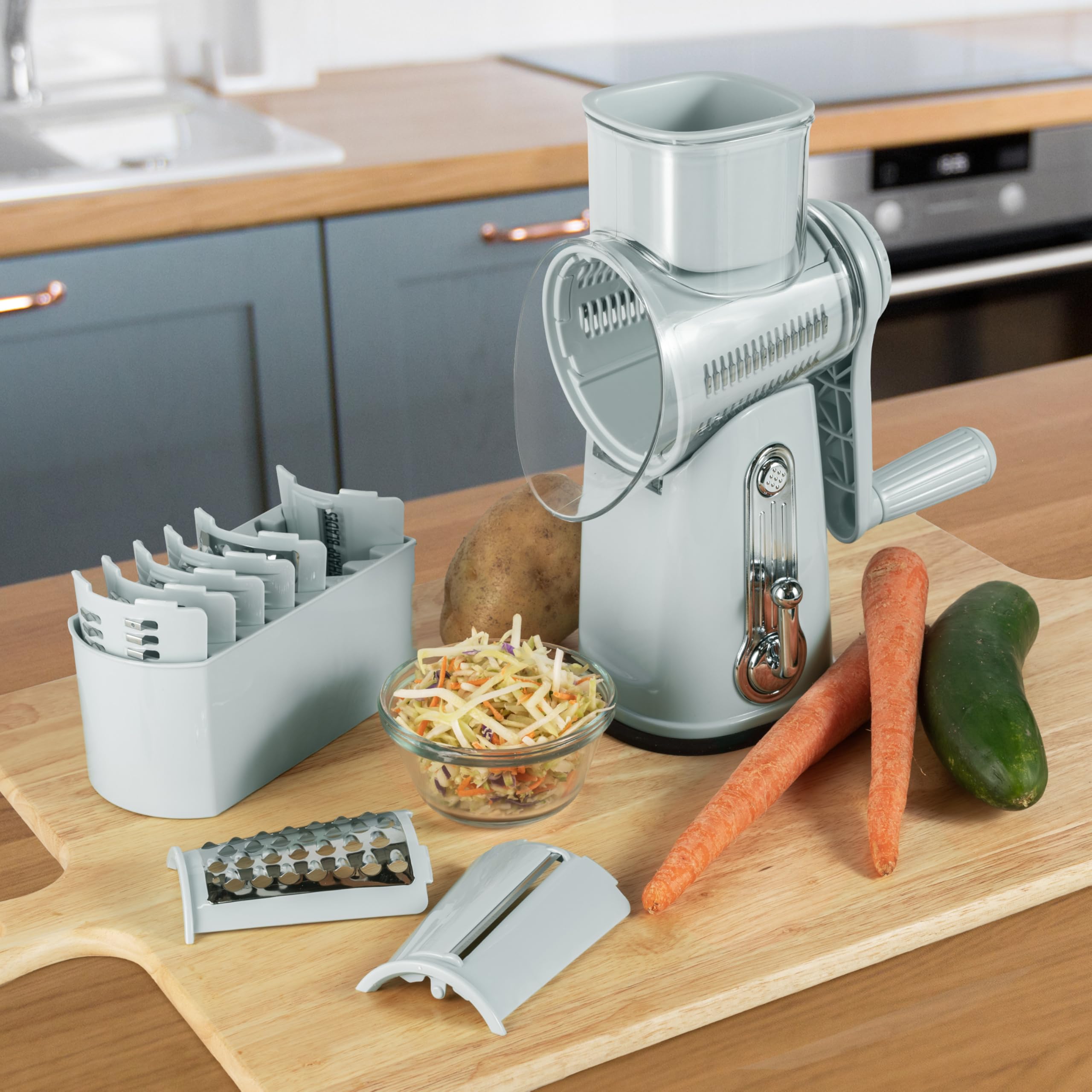 Rallador Rotatorio 5 en 1 con mano ergonómica: agarre cómodo.