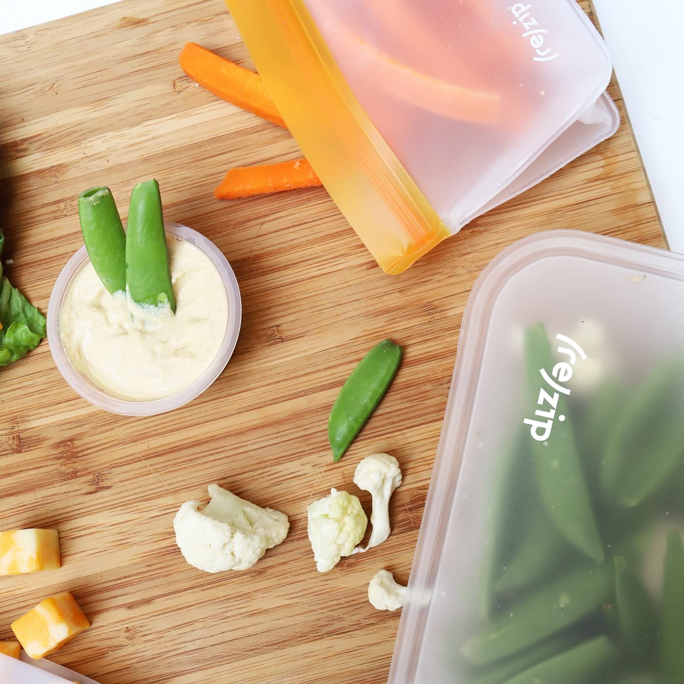 La bolsa (re)zip dos tazas apilable base ideal para porciones y meriendas