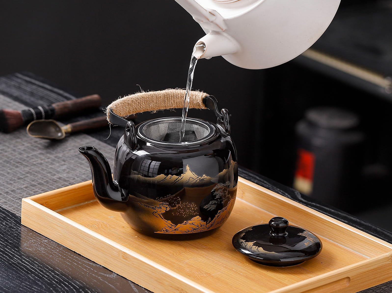 REOWONU bandeja de bambú facilita servir y drenar el té derramado.