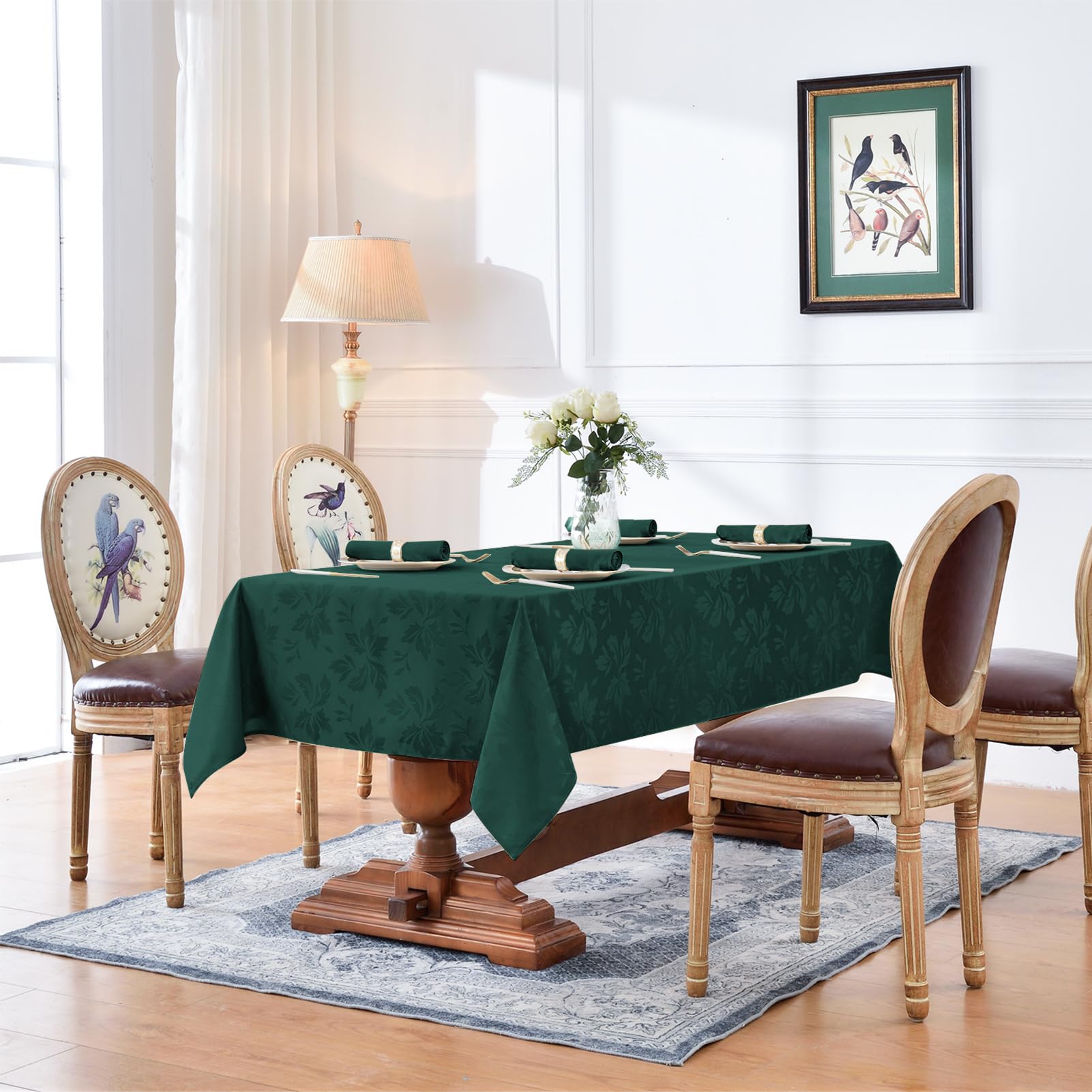 Mantel damasco floral en verde oscuro de Romanstile, ideal para reuniones