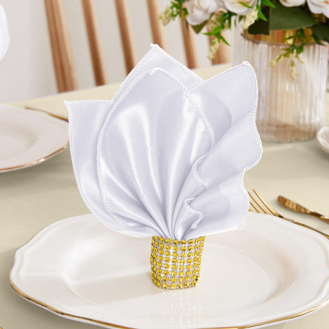 RUDONG M: ambiente de mesa elegante con servilletas satinadas.