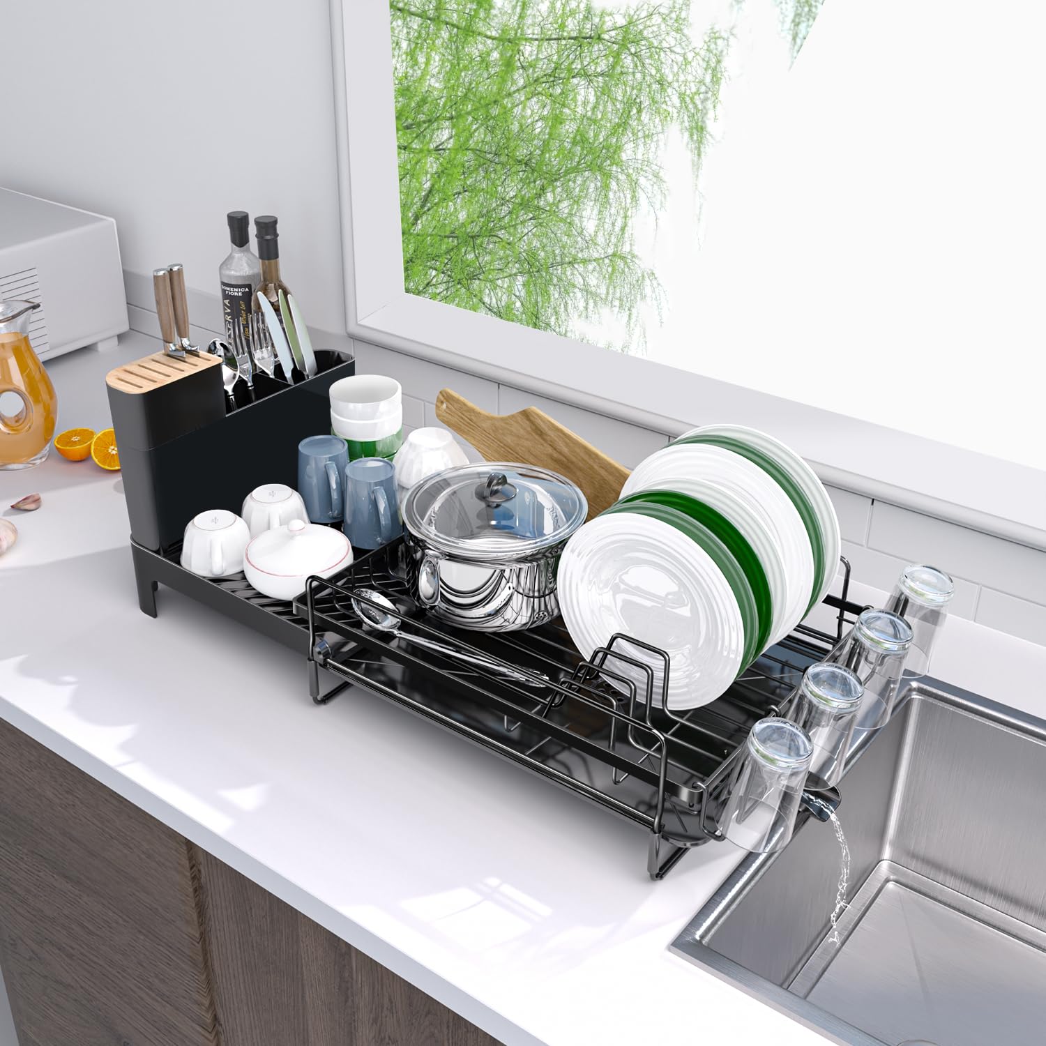 Runnatal escurridor extendible para encimeras, ideal en cocinas de diferentes anchos.