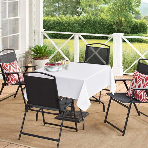 Mantel Sancua 54x54 en cena familiar, ambiente acogedor.