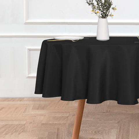 Mantel Sancua redondo 80pulgadas negro, textura poliéster suave para una mesa elegante.