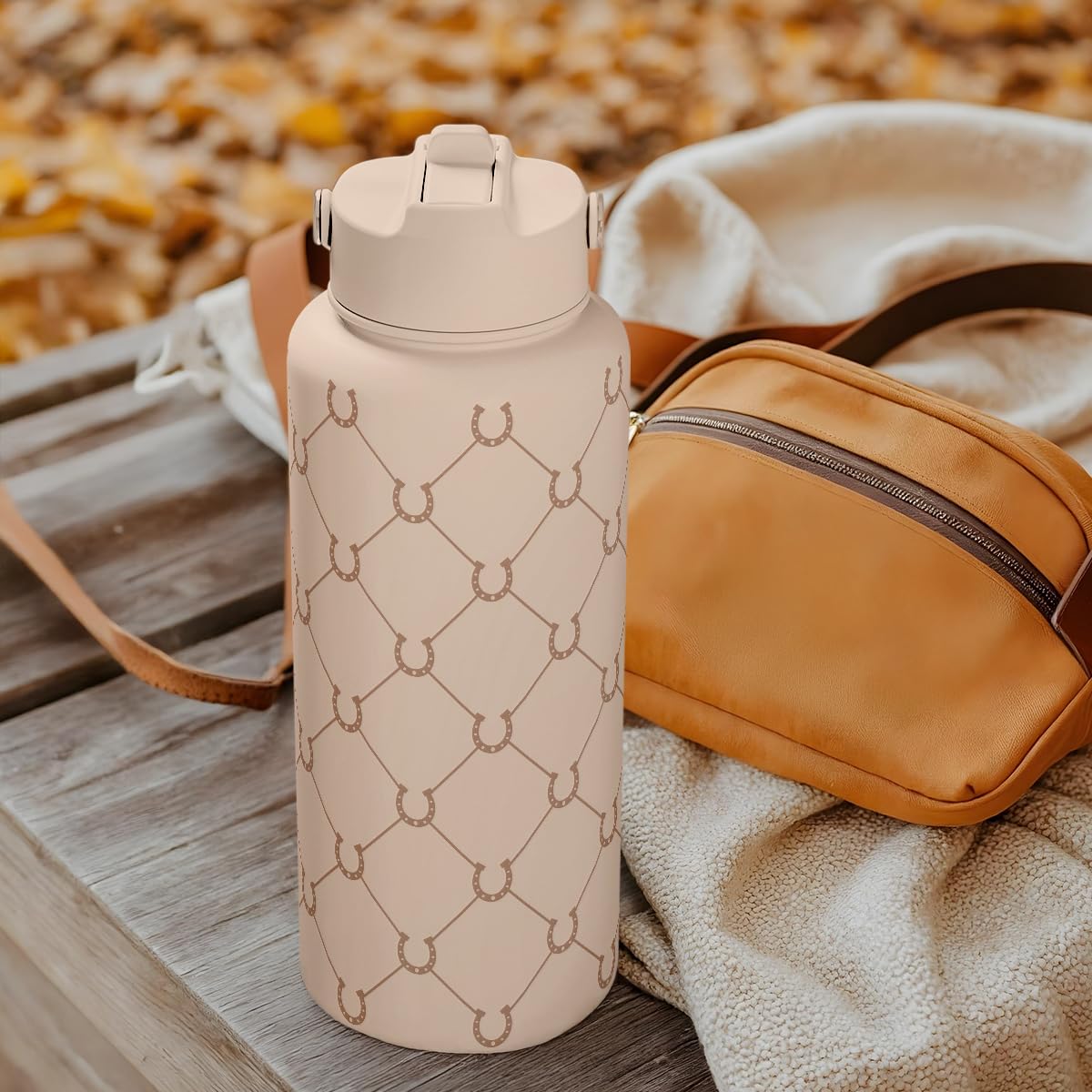 Botella SANDJEST 32oz portátil, cabe fácilmente en bolso o portaobjetos.