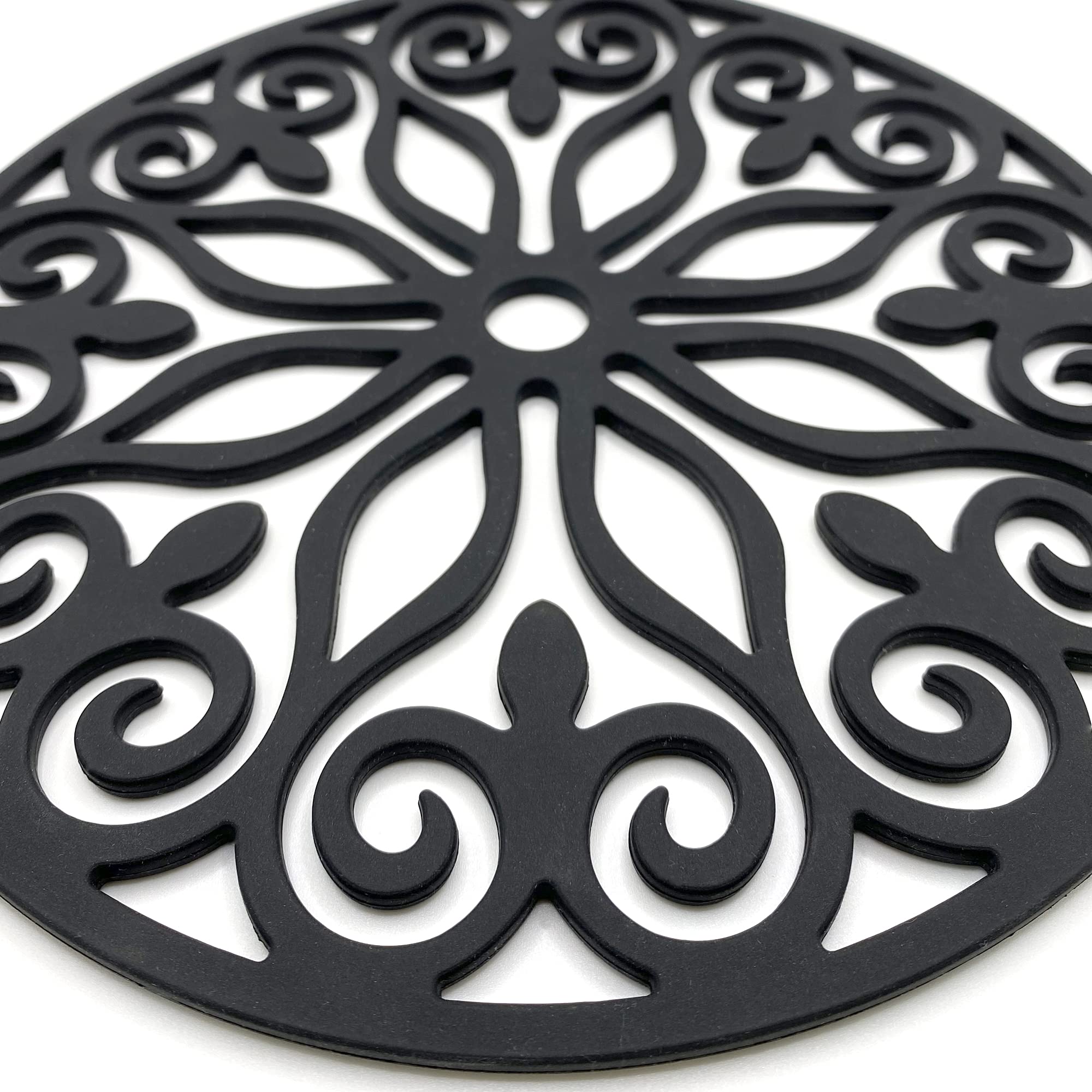 Diseño moderno SEGGAONE en negro, base segura para utensilios calientes.