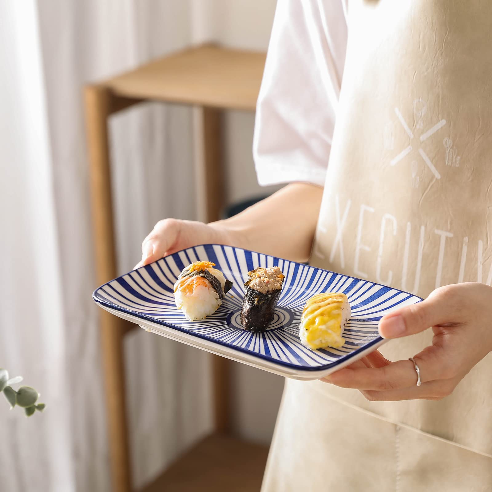 Selamica plato rectangular azul para postres, superficie lisa y fácil de limpiar.