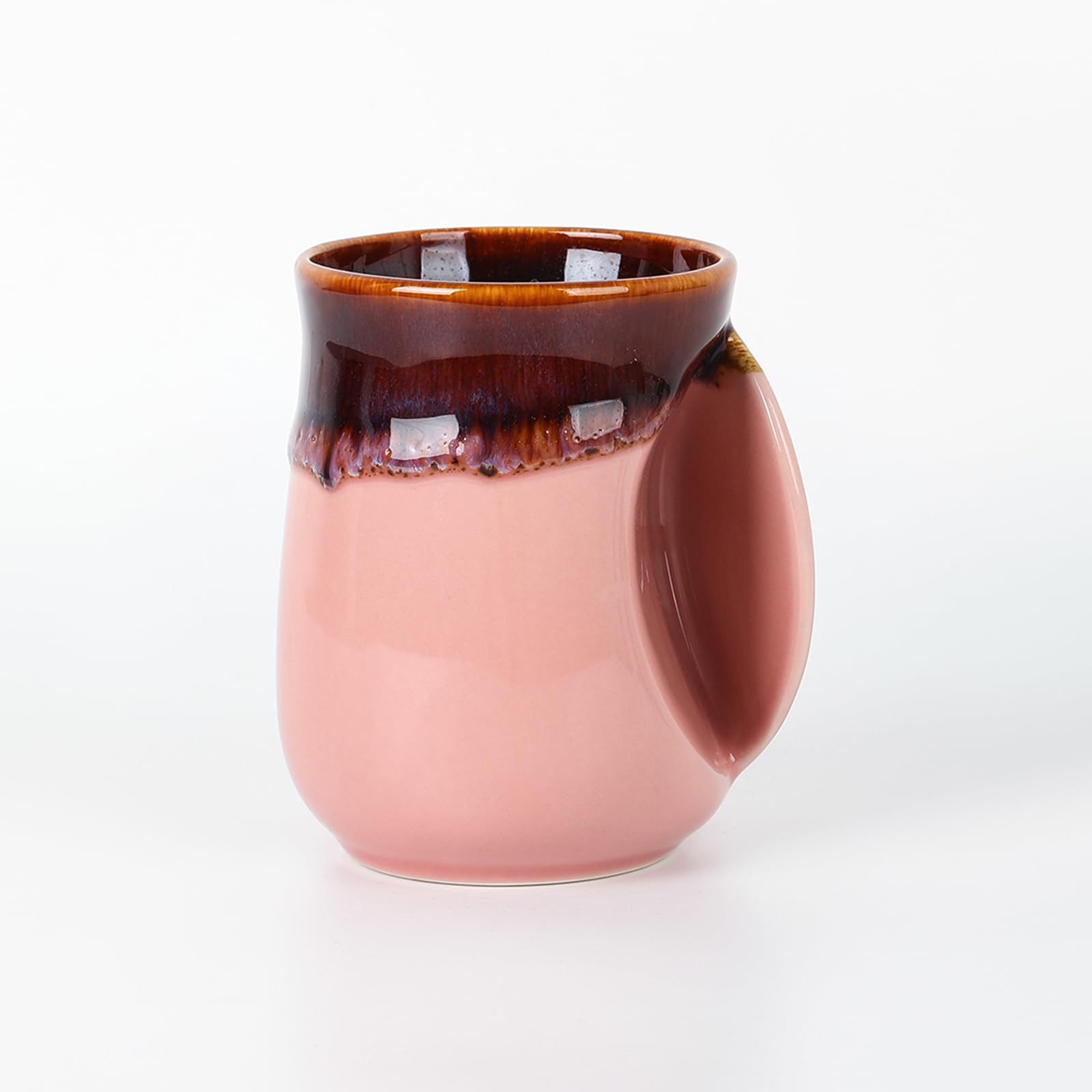 Selamica taza cerámica rosa con calentamanos para abrigar manos durante la pausa