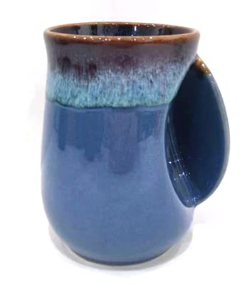 Taza Selamica de porcelana 18oz con mango derecho, ideal para café.