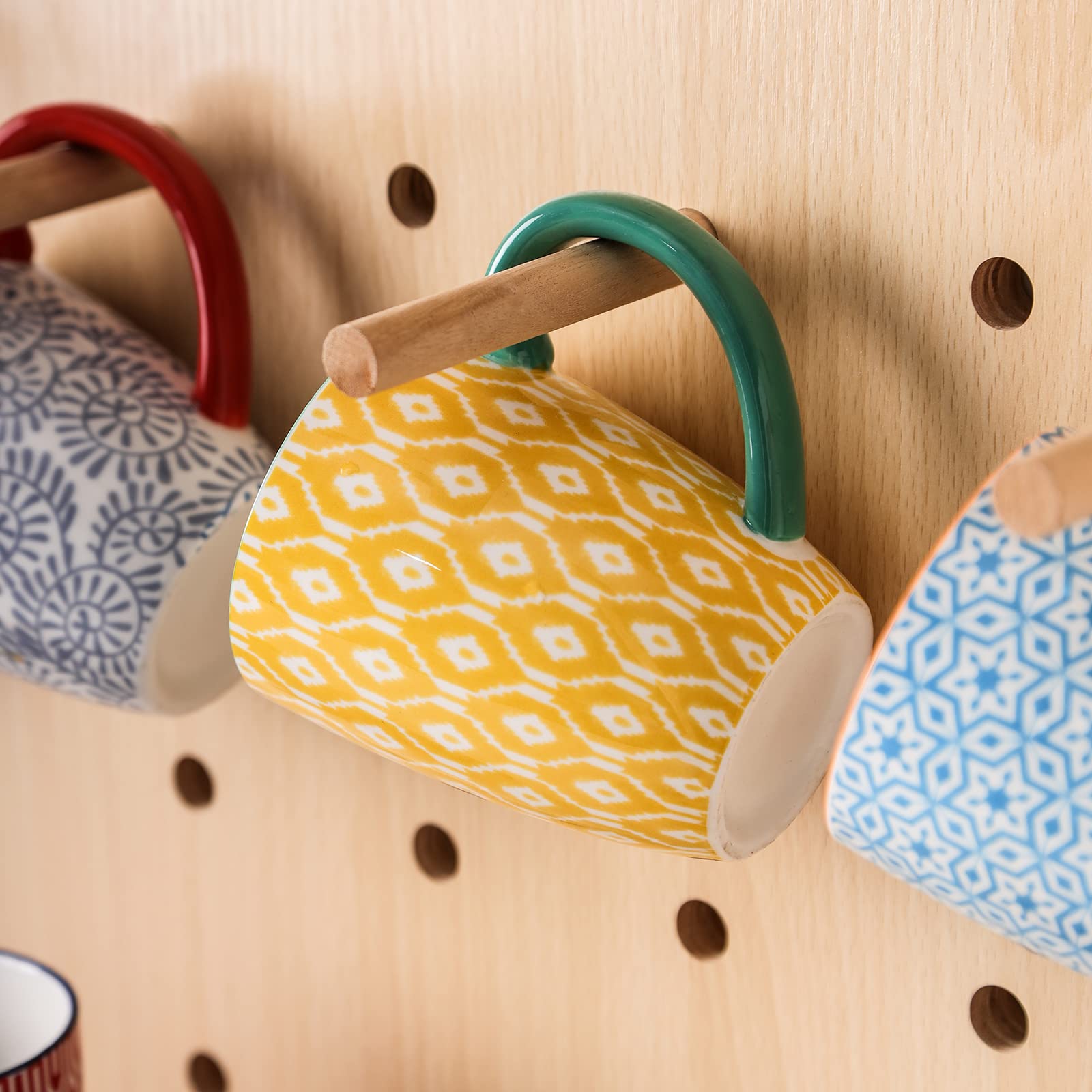 Selamica tazas con inserto de acero inoxidable para mayor duración.