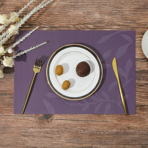 SHACOS salvamanteles hoja morada, reversibles para dos estilos de mesa.