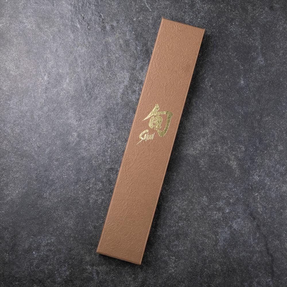 Shun Premier Nakiri, acabado tsuchime que facilita el deslizamiento y la limpieza.
