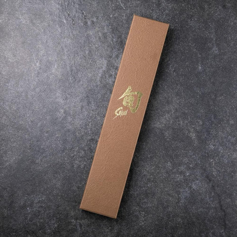Shun Premier Nakiri, acabado tsuchime que facilita el deslizamiento y la limpieza.