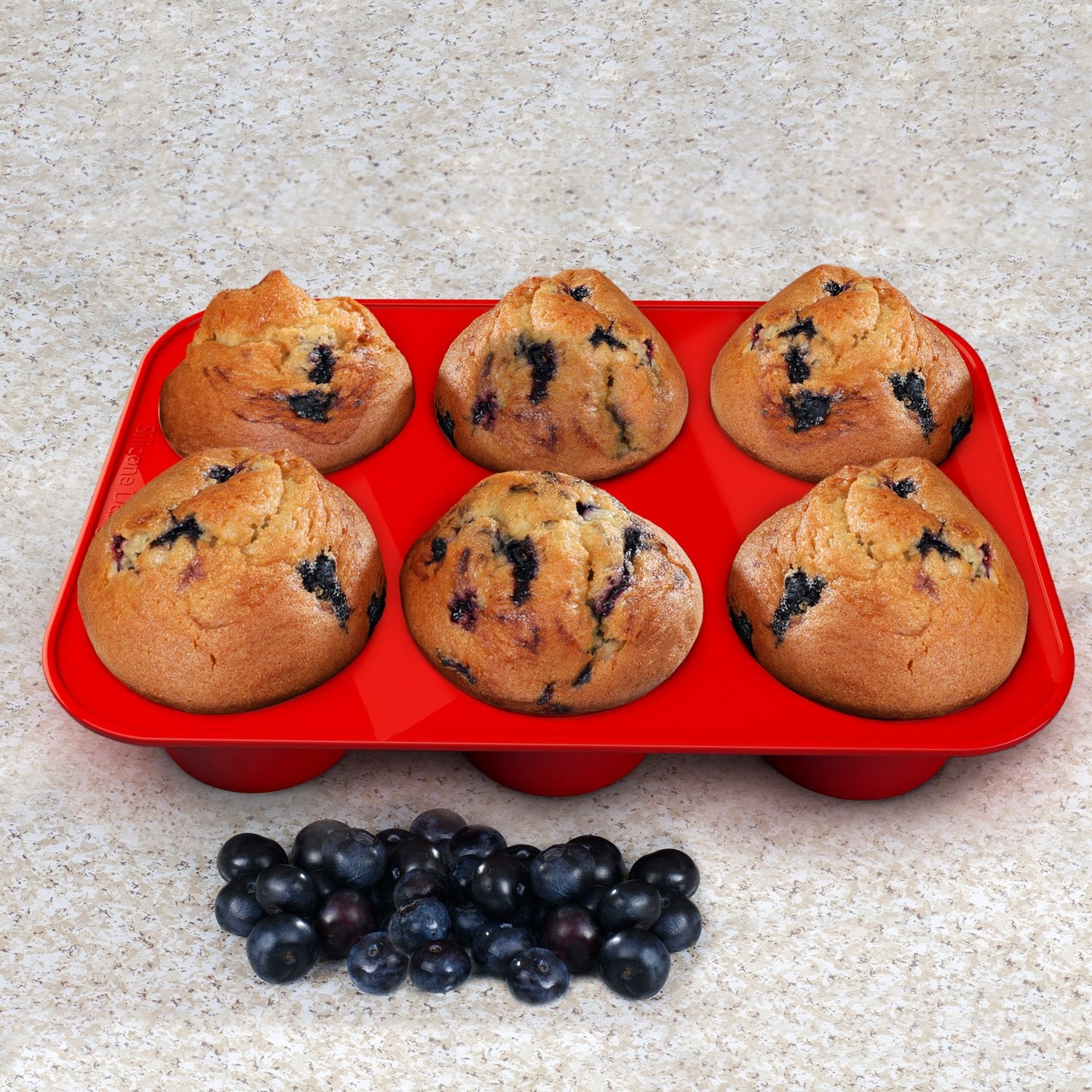 Juego de dos moldes Silicone Designs para muffins de 6 cavidades, versatilidad para hornear.