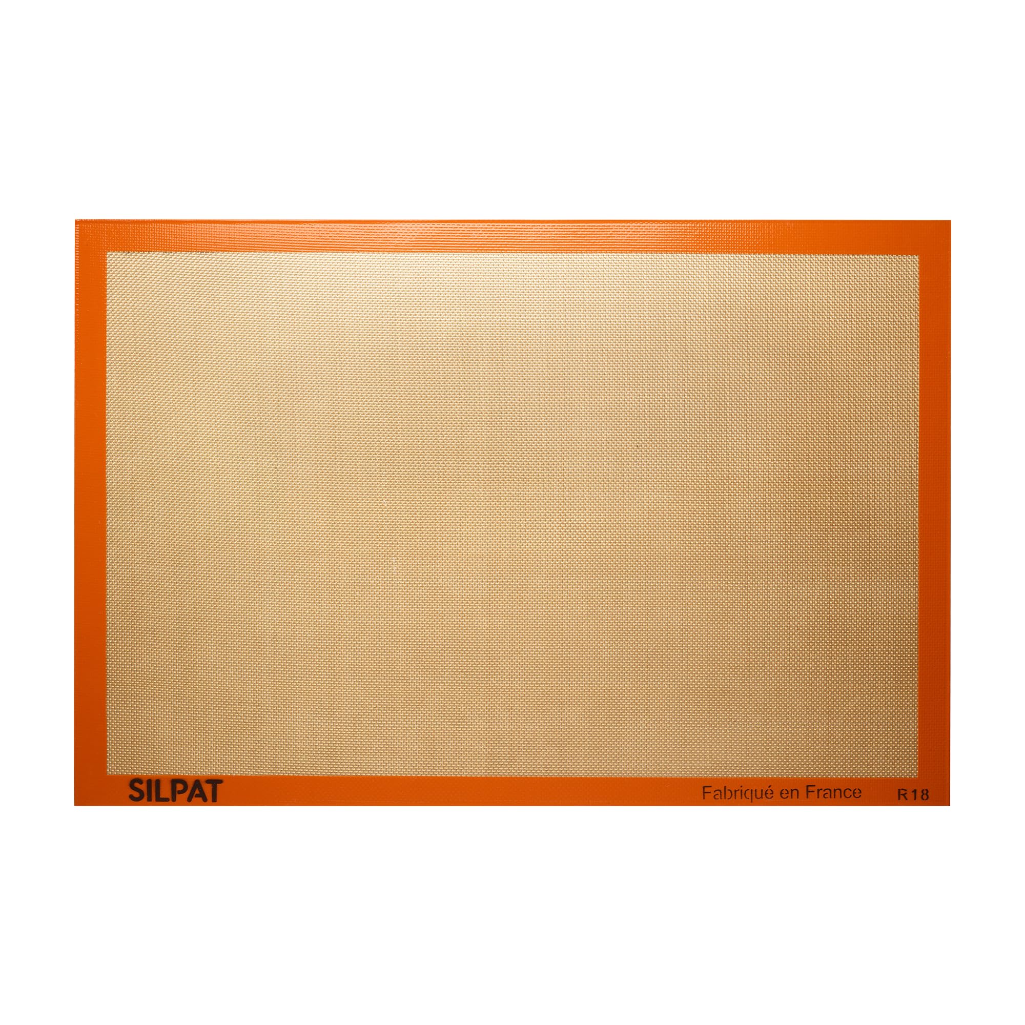 Silpat mat de horneado original en uso, antiadherente para hornear sin esfuerzo.