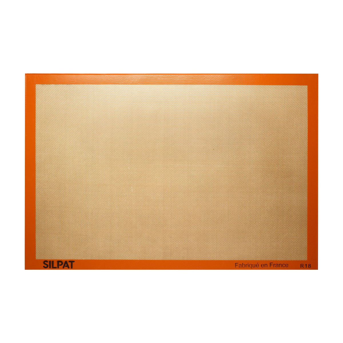Silpat mat de horneado original en uso, antiadherente para hornear sin esfuerzo.