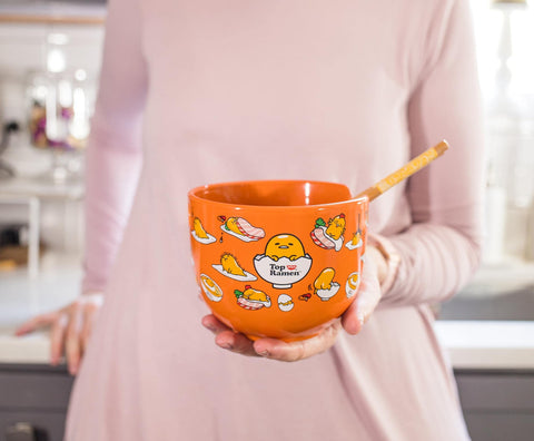 Empaque en lata retro Gudetama, colección oficial para fans.