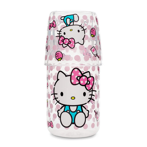 Detalle del estampado Hello Kitty con puntos rosas y lazos.