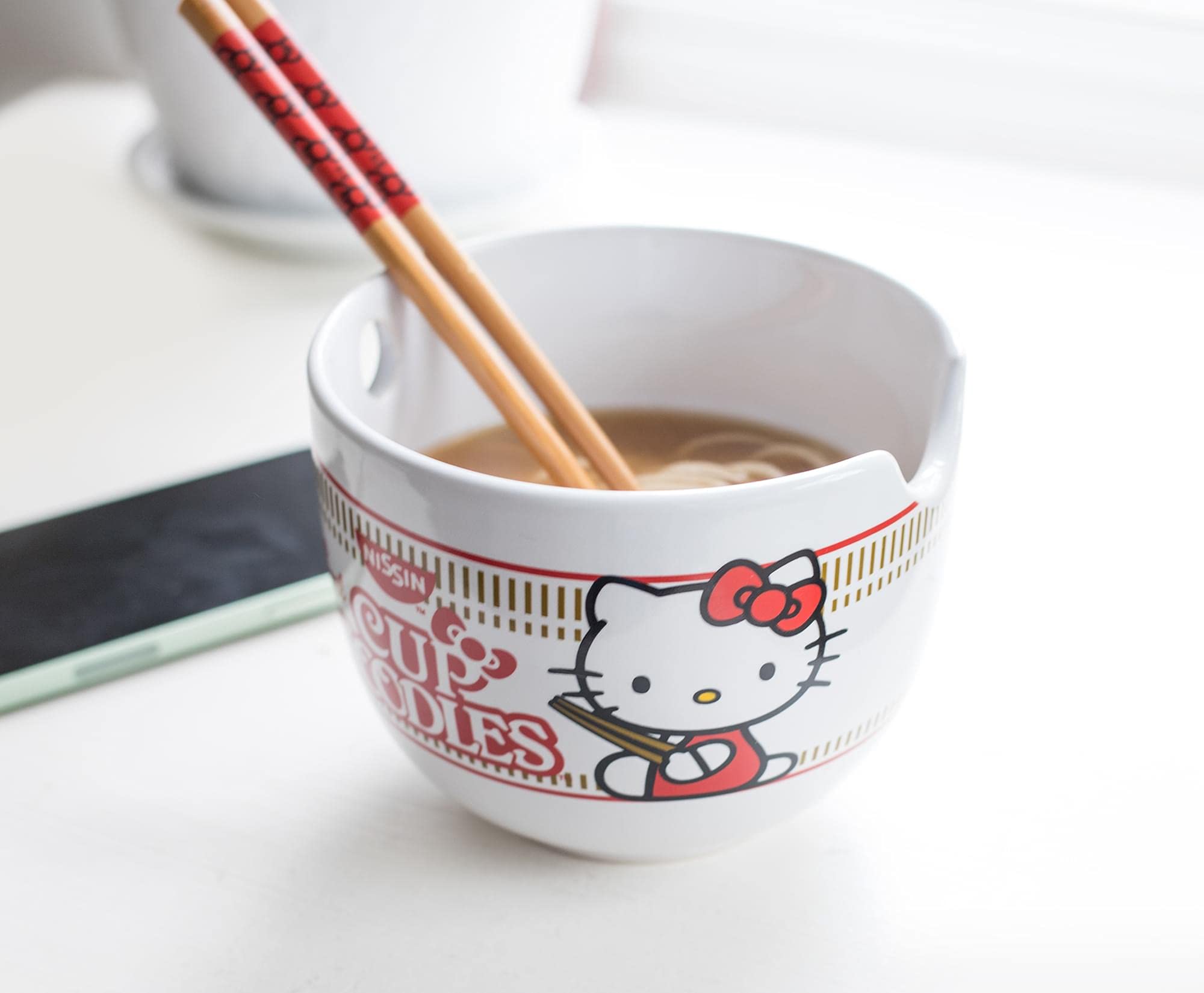 Regalo temático Hello Kitty oficial de Silver Buffalo para amantes de la cocina asiática.