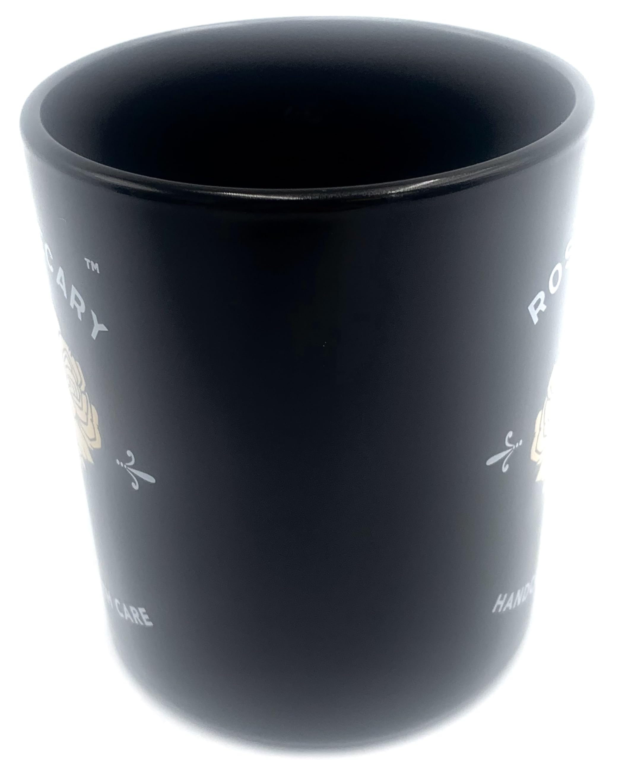Vista superior de la cerámica negra con borde dorado y logo Rose Apothecary.