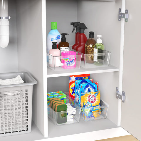 Simple Houseware: organización de frutas y verduras en contenedores transparentes para mejor flujo en la cocina.