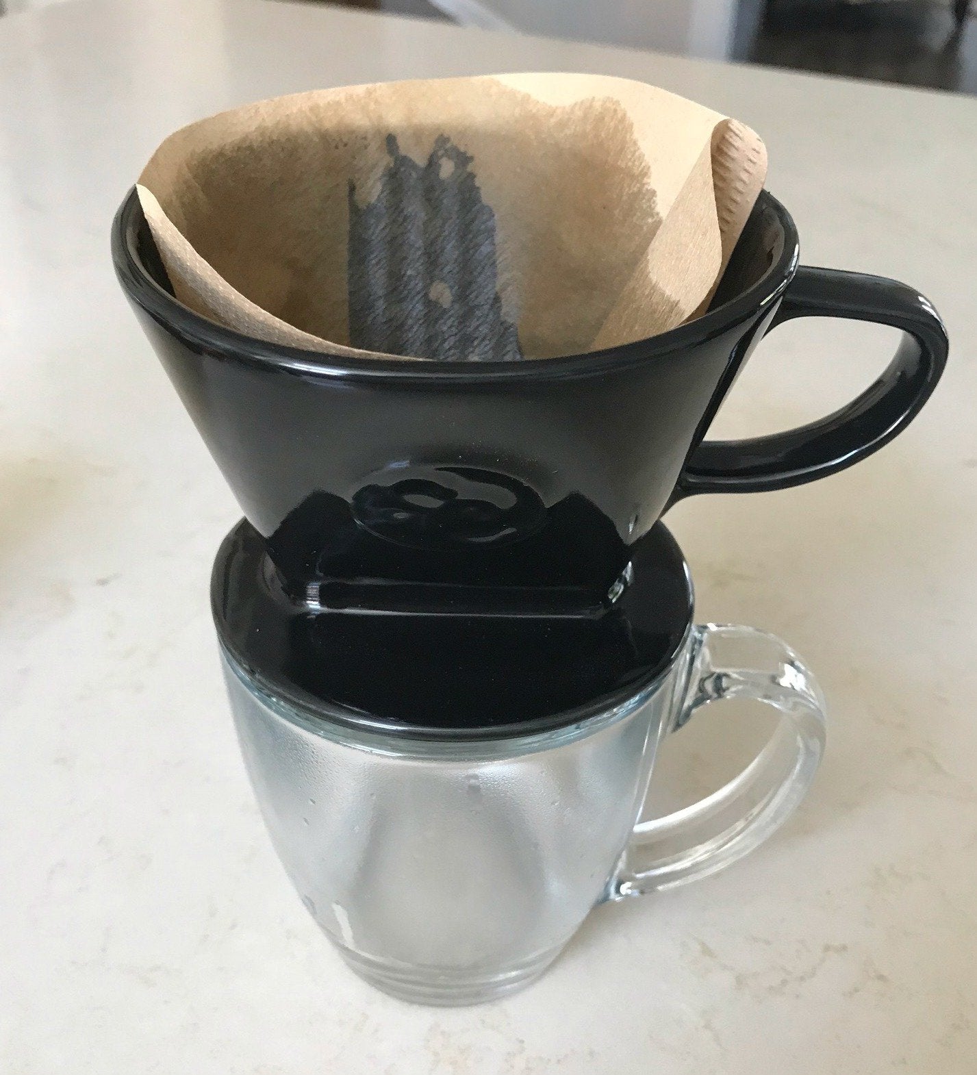 Simply Charmed: filtros Melitta tamaño 2 incluidos para inicio rápido.