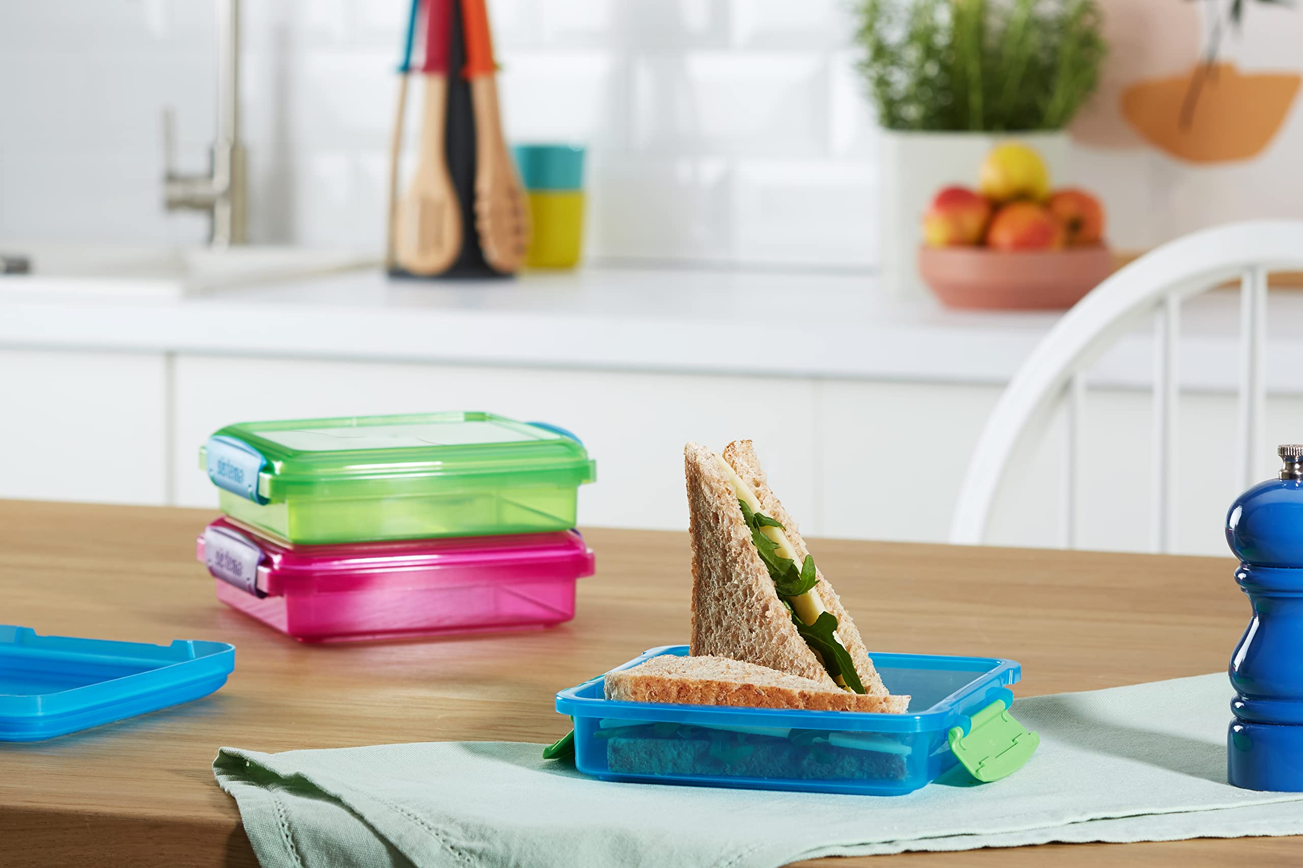 Sistema en verde: tres contenedores apilables para almuerzos organizados.