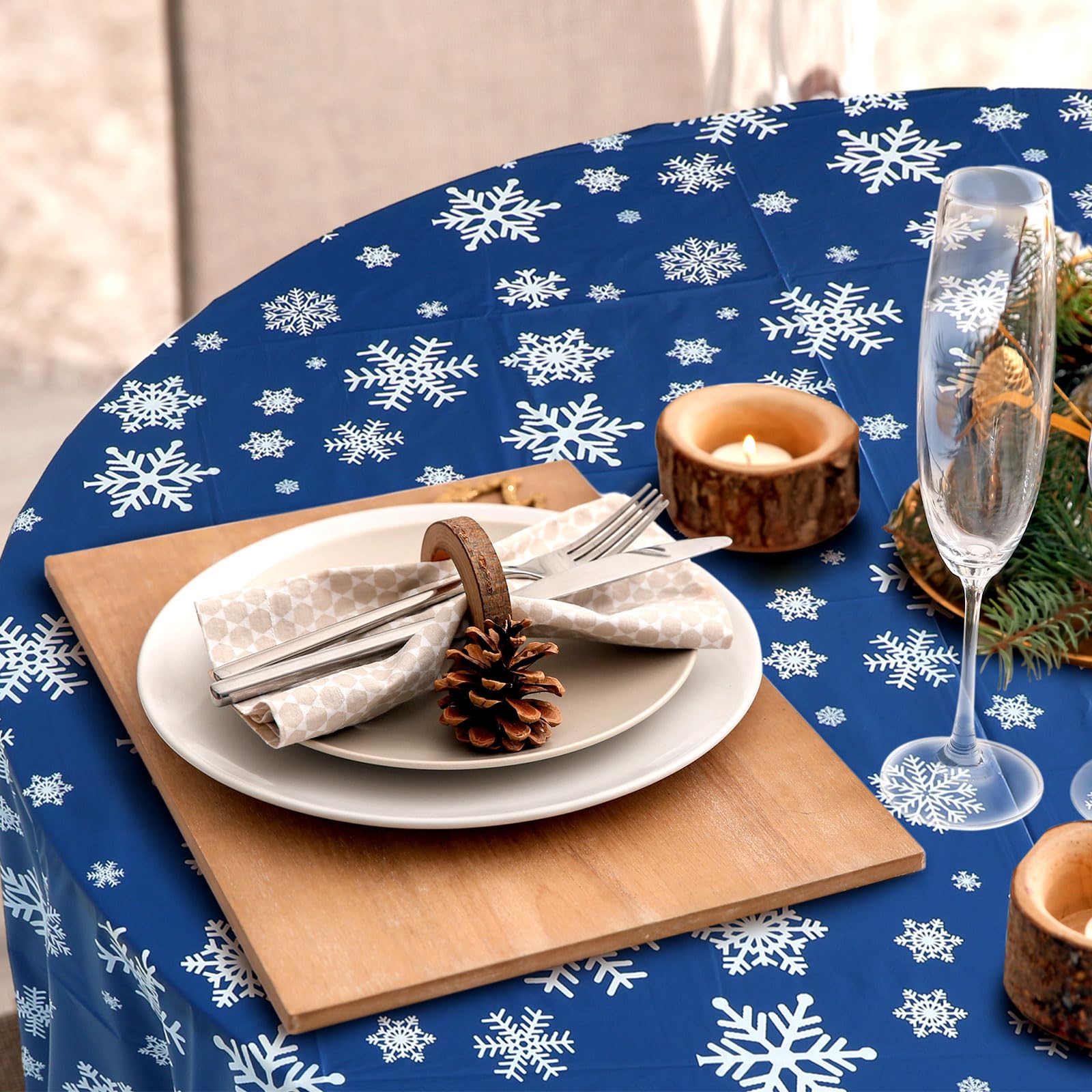 Mantel redondo para 8-10 personas, de Sliner, azul y decorativo con copos.