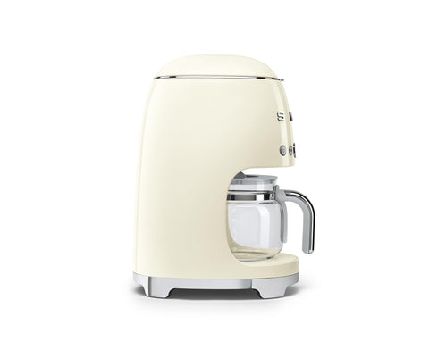 Smeg cafetera crema, filtro reutilizable, reduce residuos.
