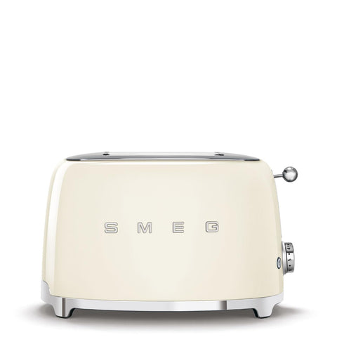 Tostadora SMEG 2 rebanadas crema, vista frontal que realza la encimera