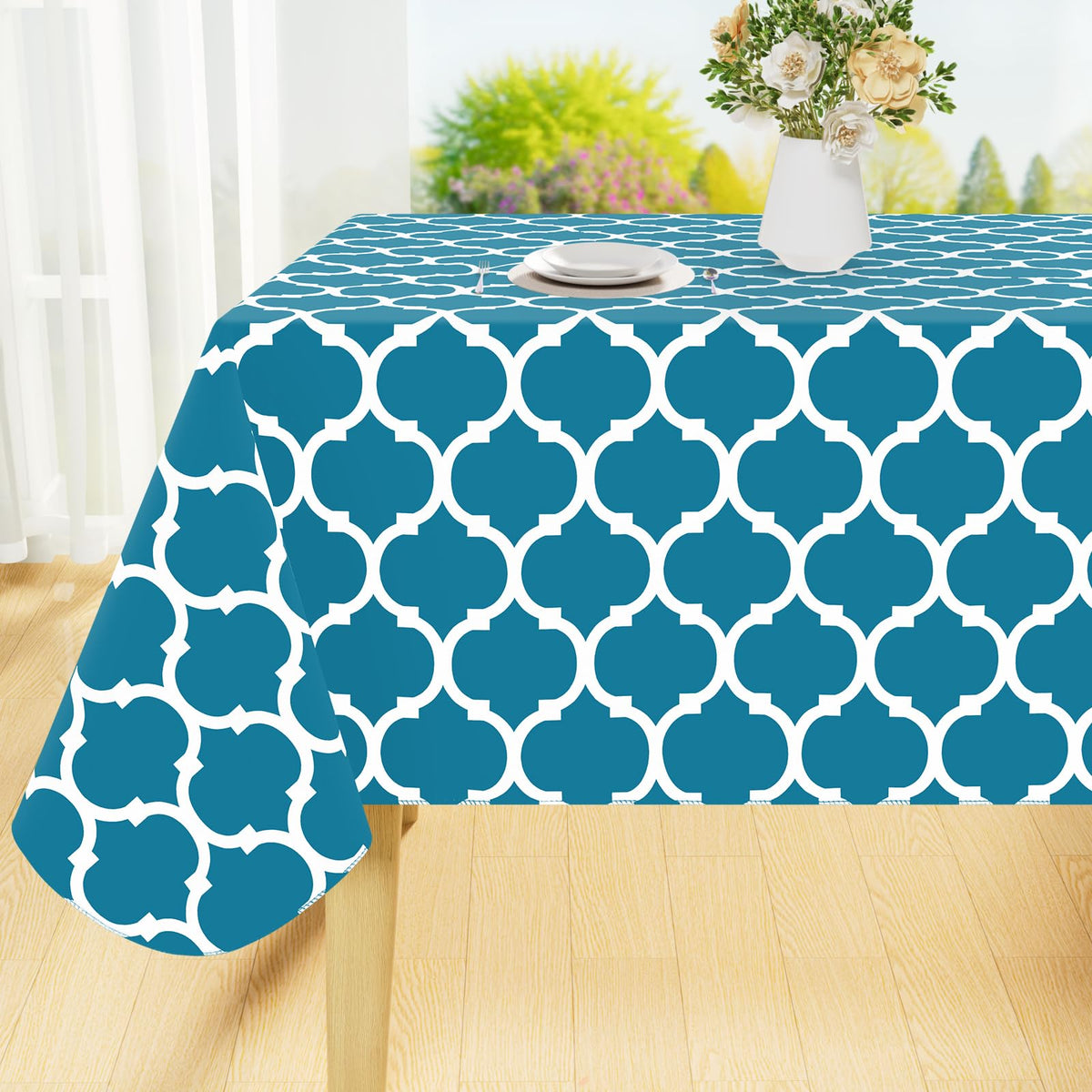 Mantel Smiry color turquesa, vista general para mesa; protege de manchas y derrames.