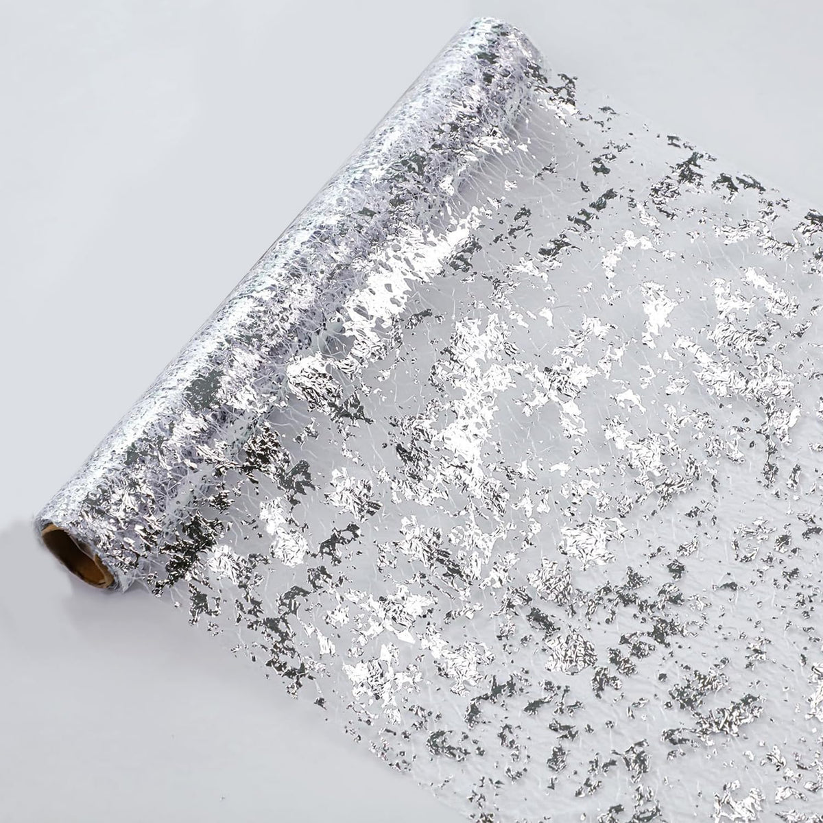 Snowkingdom cinta mantel plateada con brillo para mesas elegantes.