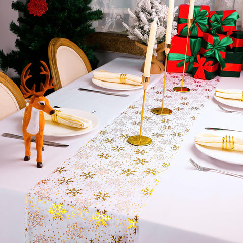 Snowkingdom: diseño de copos de nieve dorados que realzan la mesa para fiestas