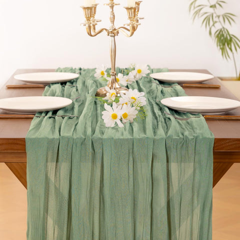 Socomi mantel de gasa verde salvia en ambiente decorativo, elegante y versátil.