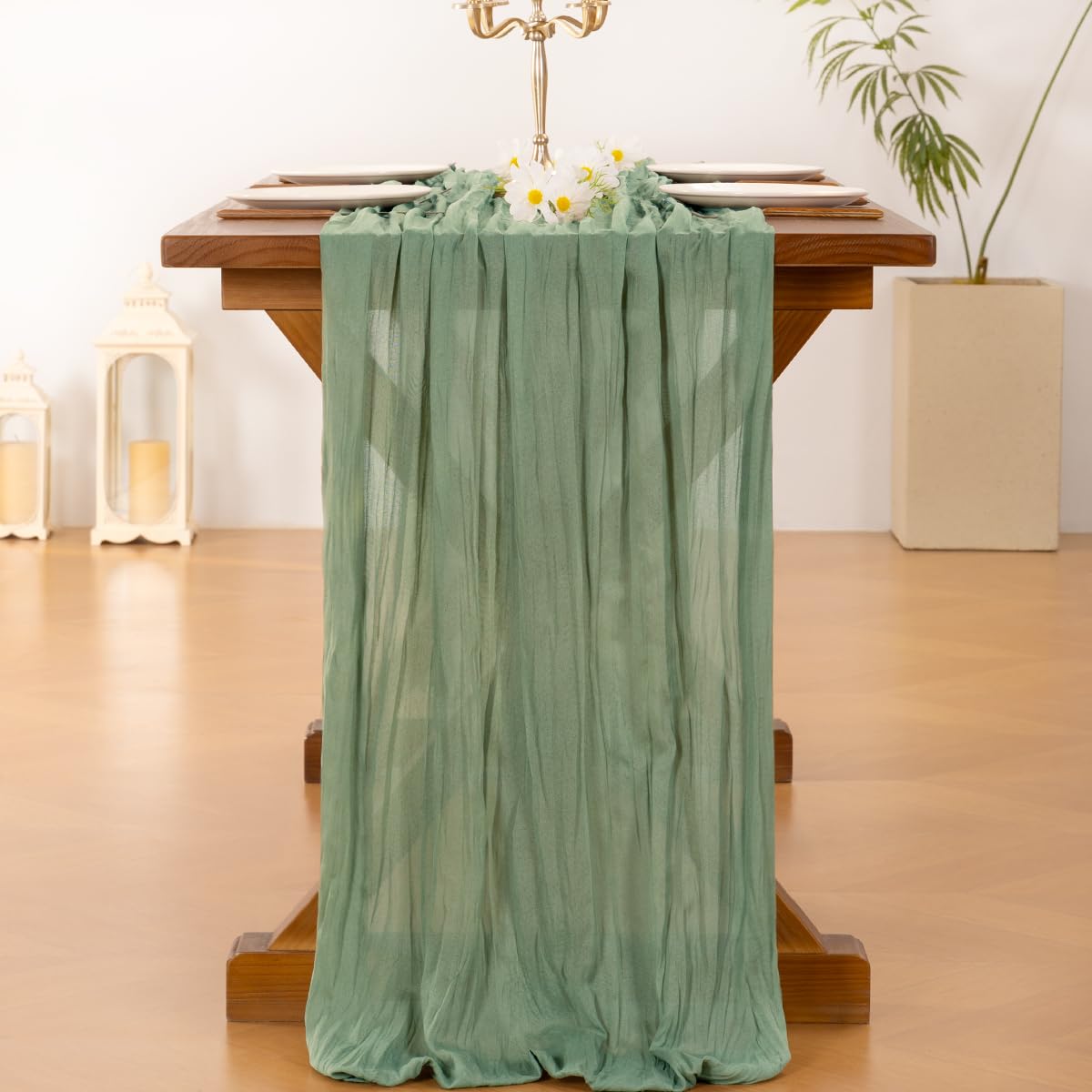 Socomi mantel de gasa verde salvia en exterior, crea ambiente suave.
