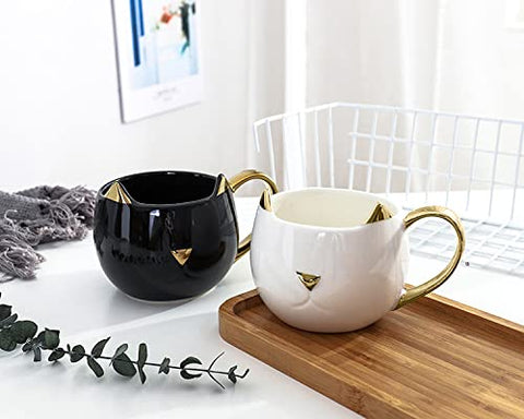 SOUJOY detalle dorado en taza gato, mango ergonómico para beber con comodidad.
