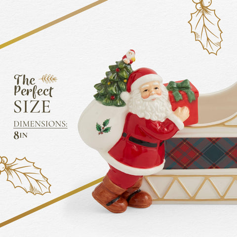 Spode exhibición de regalos navideños junto al trineo para mesa