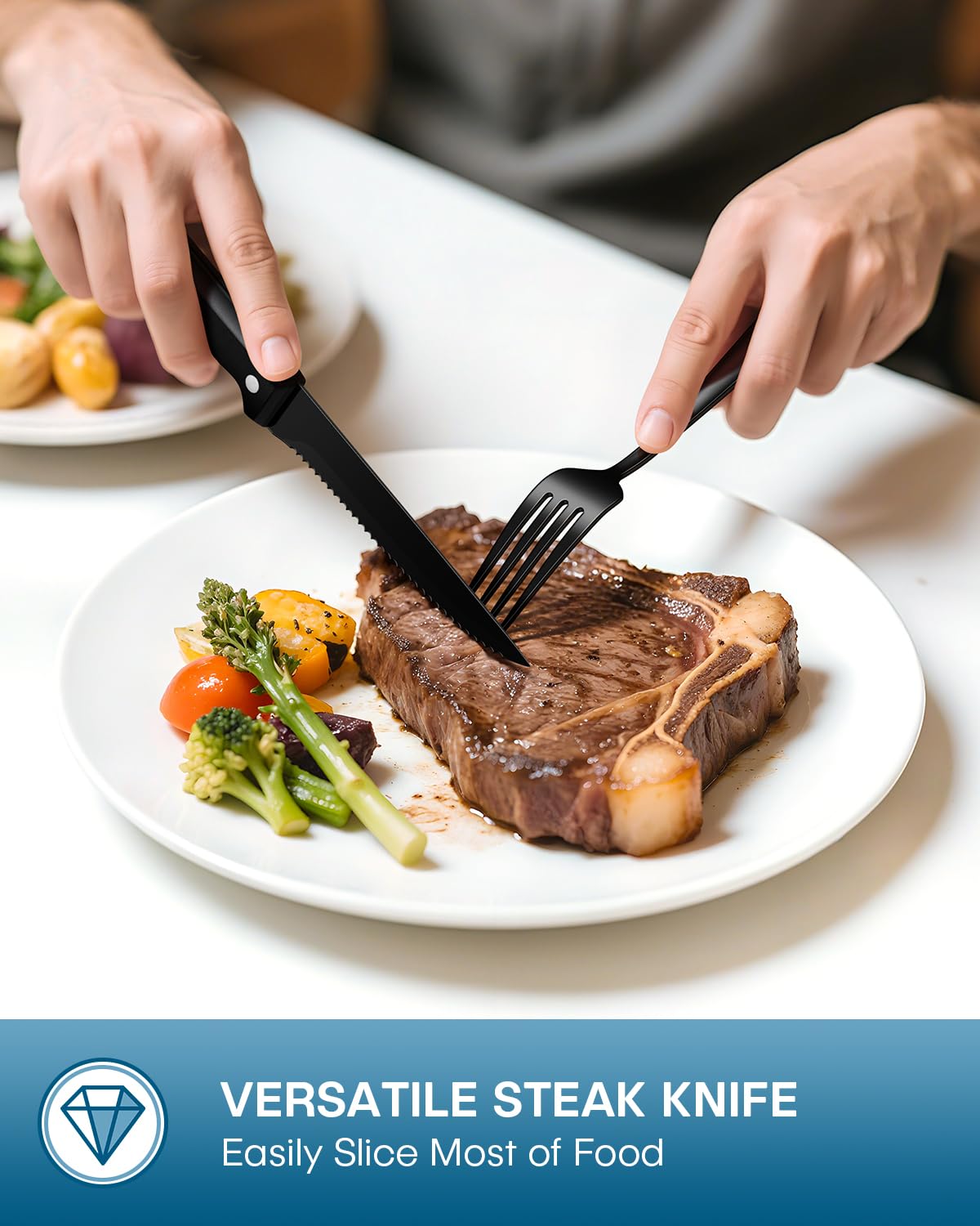 Tenedores de cena Stapava negros en acero inoxidable para platos abundantes.