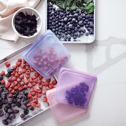Stasher contenedor reutilizable para alimentos, reduce residuos.