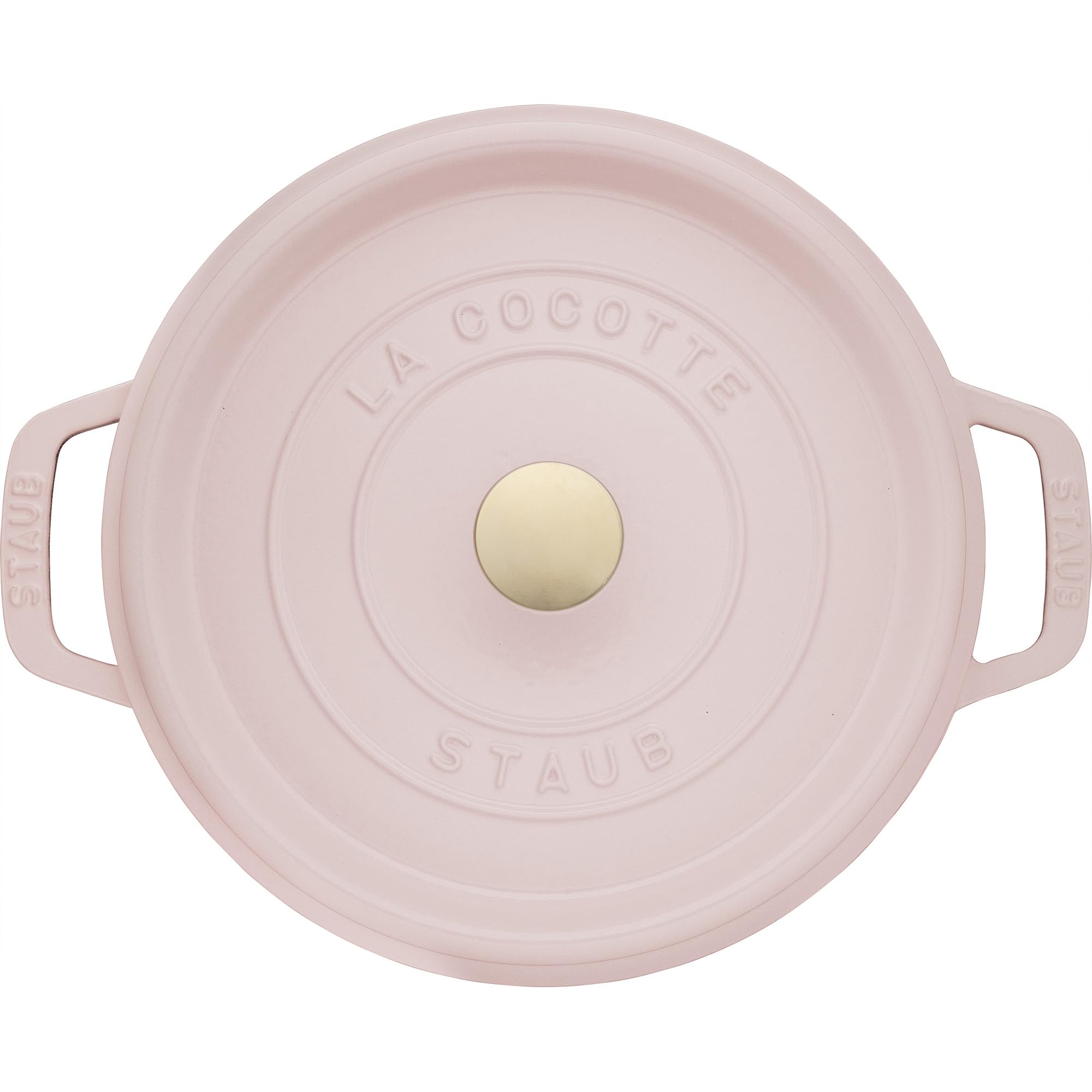 Staub interior esmaltado mate negro, dorados y jugos bien sellados.