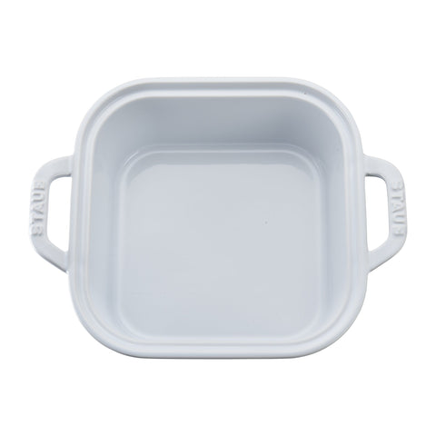 Manguitos ergonómicos STAUB para un agarre seguro al manipular caliente.