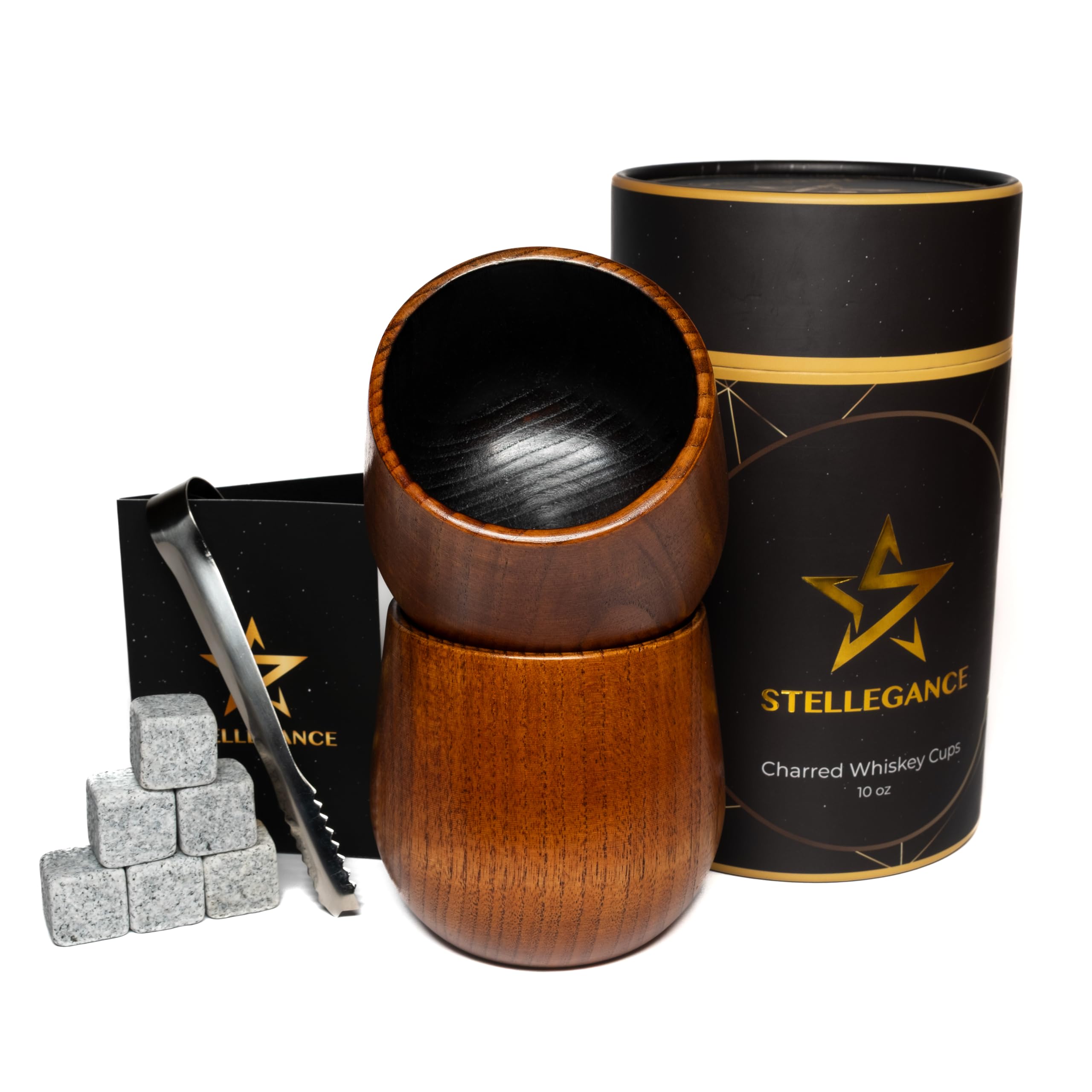Vaso STELLEGANCE de bourbon con madera carbonizada en primer plano, degustación elegante.